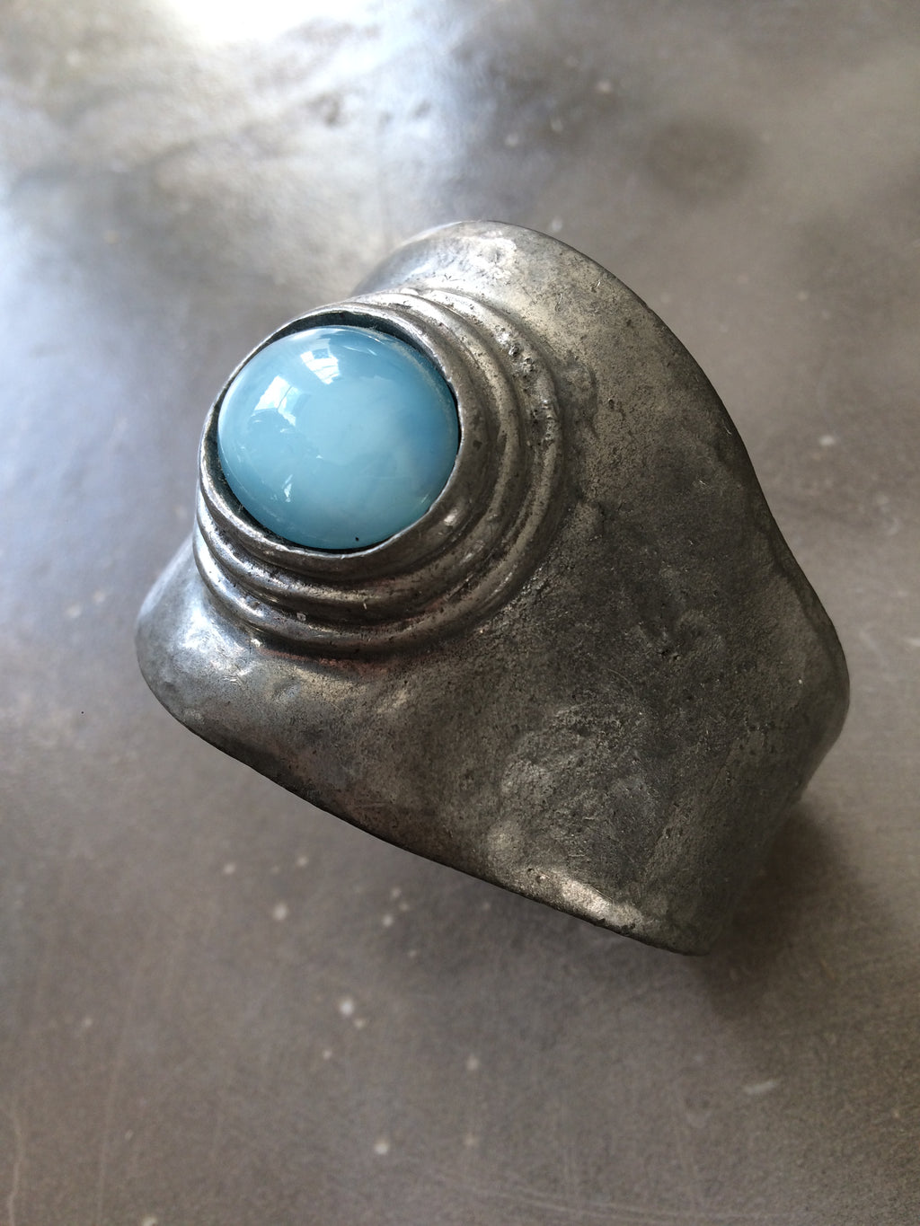 vintage sterling silver plated cuff with blue stone